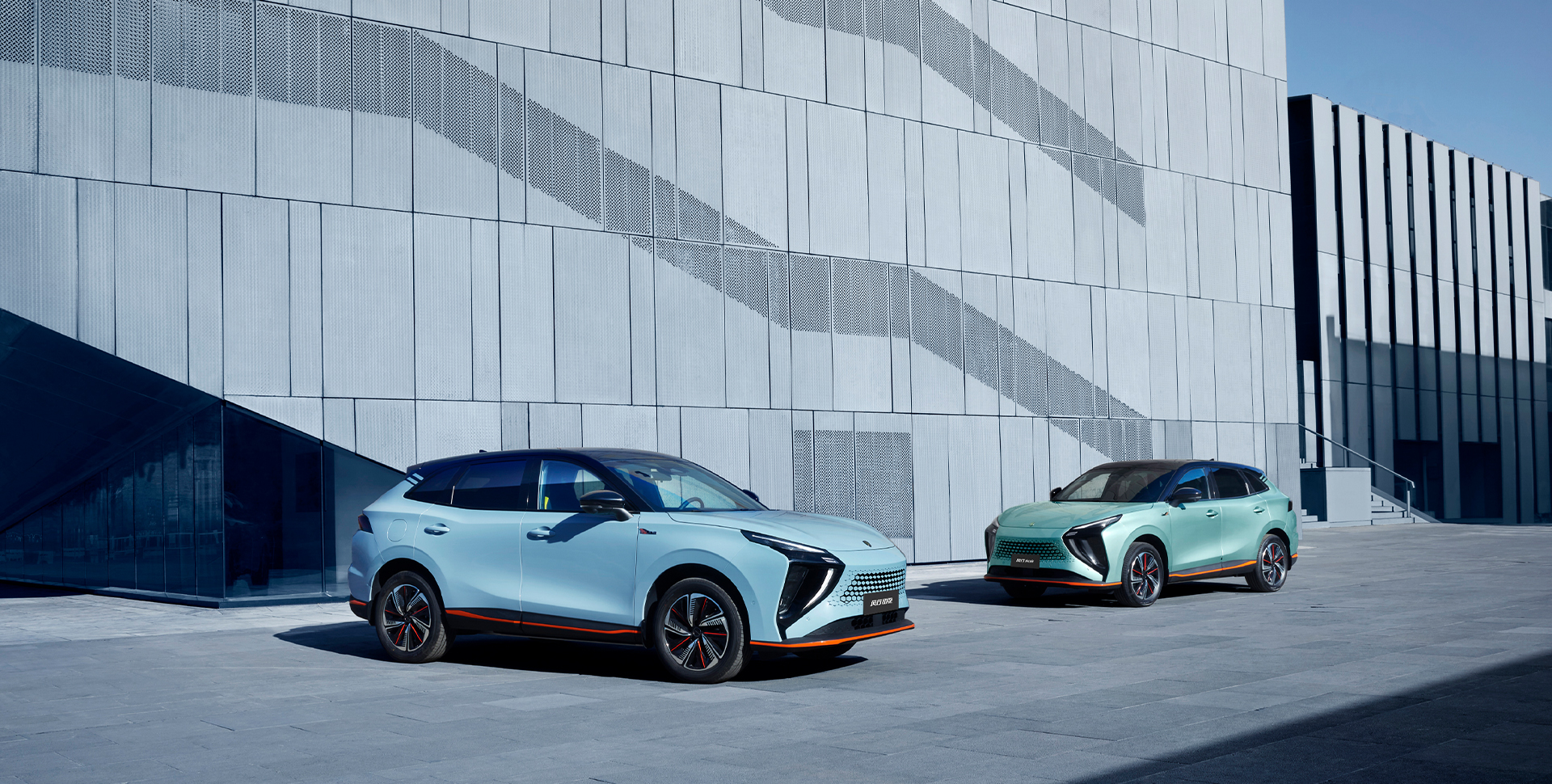 Forthing vehicles in front of modern architecture